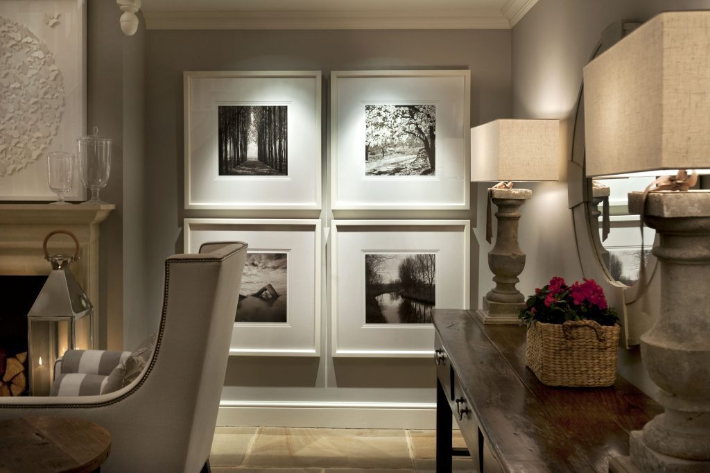 Collection of wall art work in stunning entrance interior
