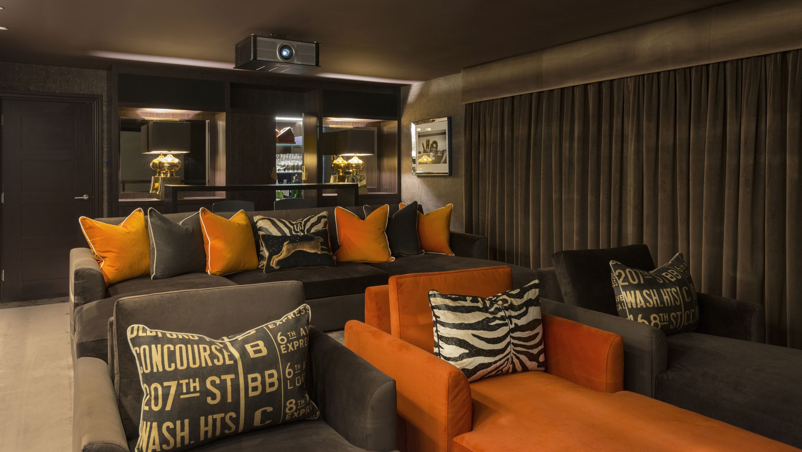 Stunning home cinema with bespoke cocktail bar carefull illuminated
