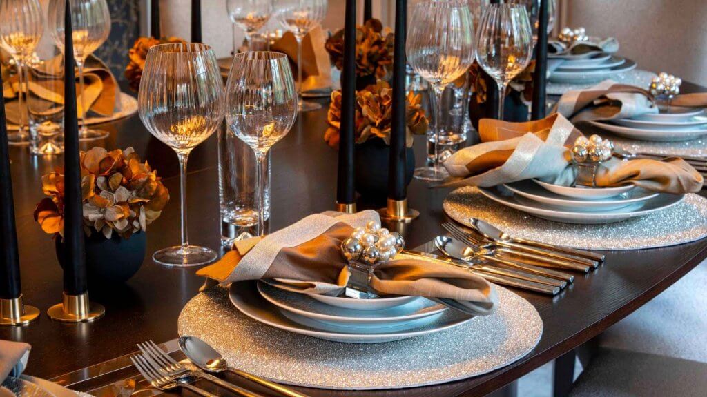Bespoke dining table designed by April Hamilton, glasses LSA