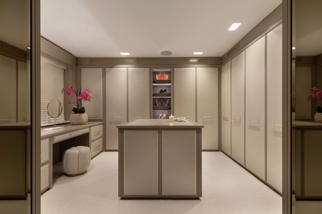 Dressing room accessories & luxury home accessories create this stumputous walk in for discerning clients