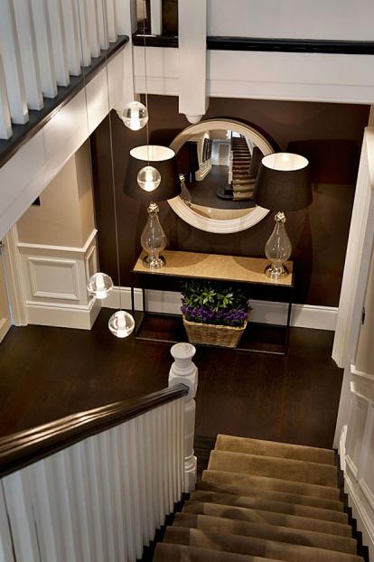 Sophisticated entrance hall design with chocolate tones
