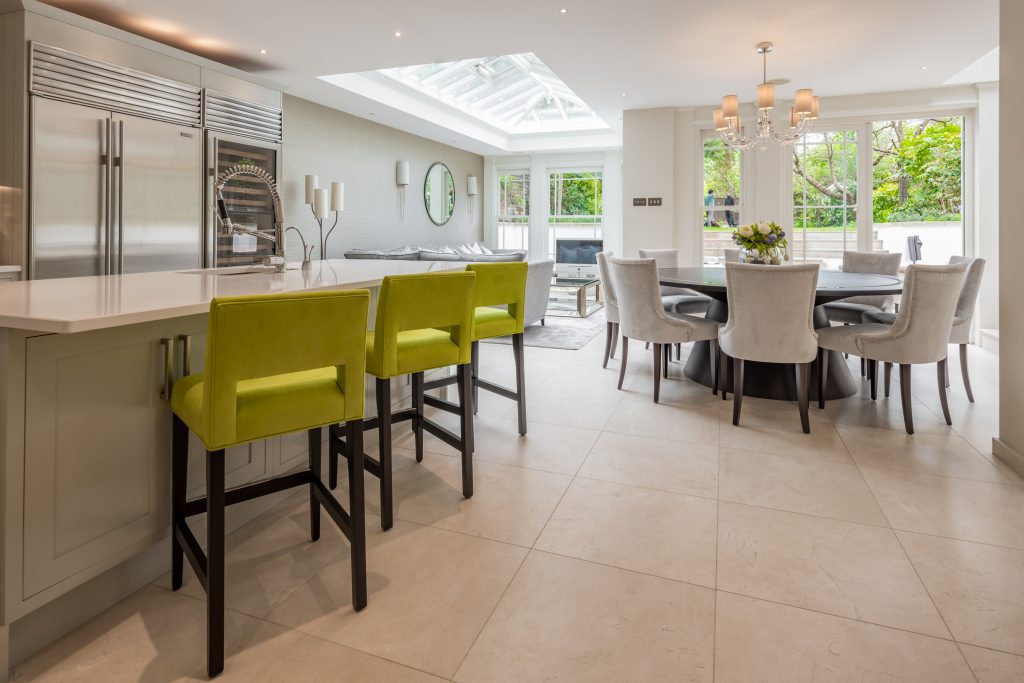 Open plan kitchen living and dining room with bespoke furniture and stunning orangery extension